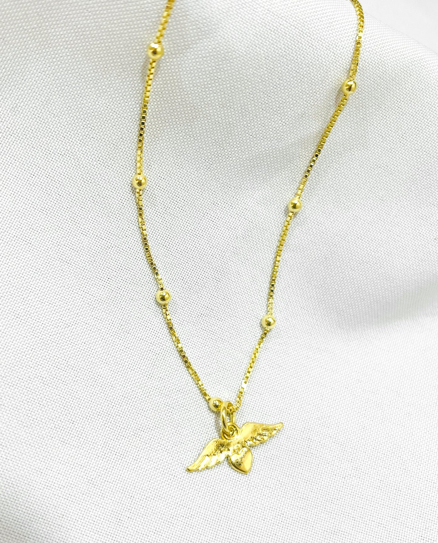 Collar corazón alado