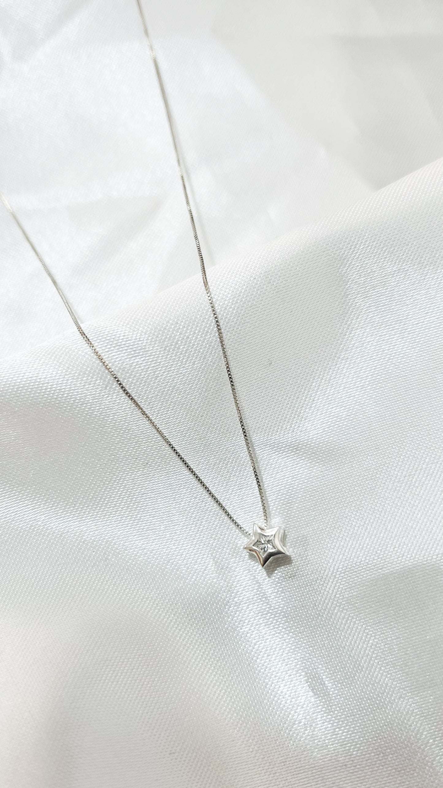 Collar punto de luz estrella