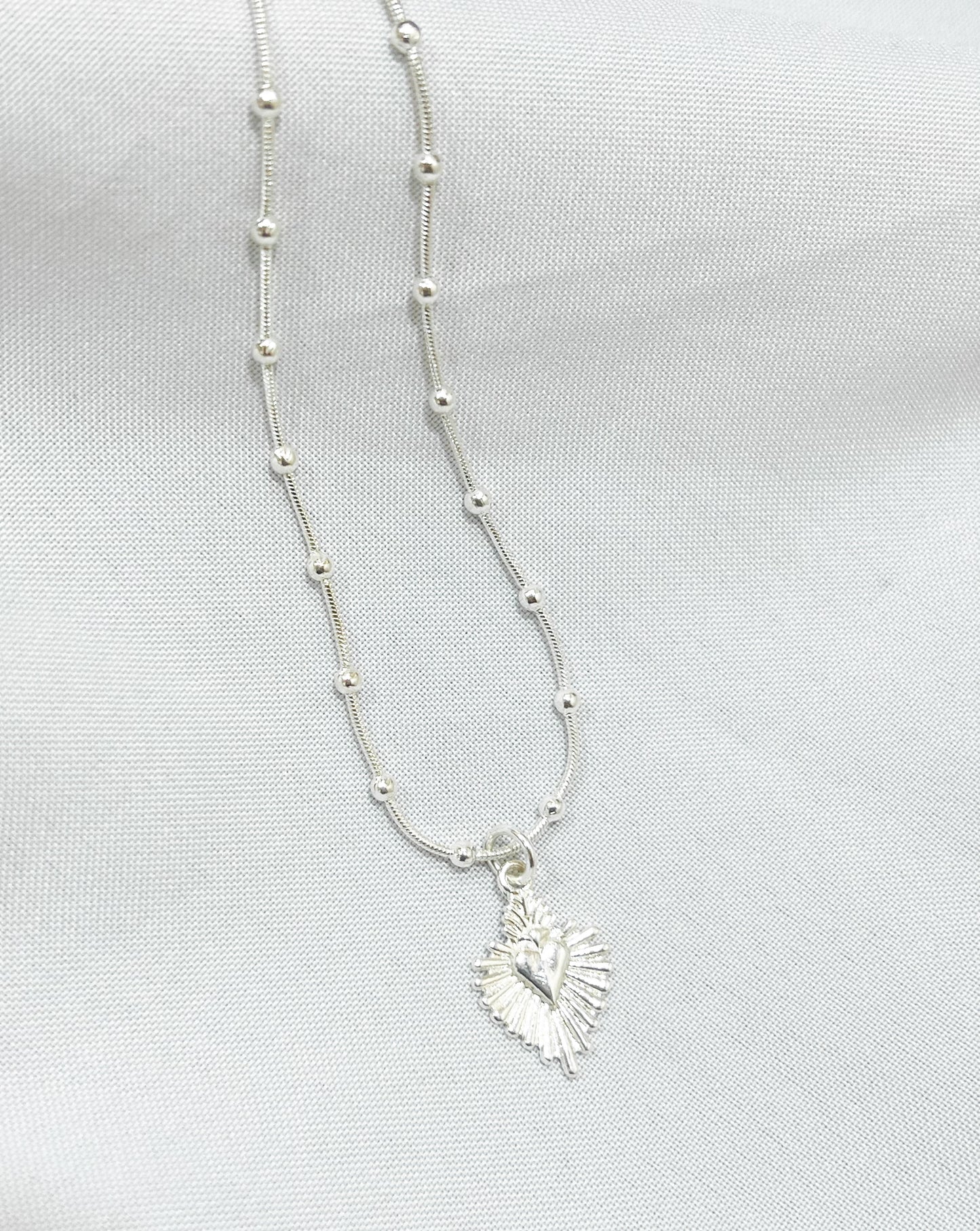 Collar corazón detente
